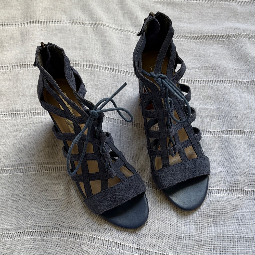 Aubrey Lynn blue suede gladiator-style heels with a tie and zip closure